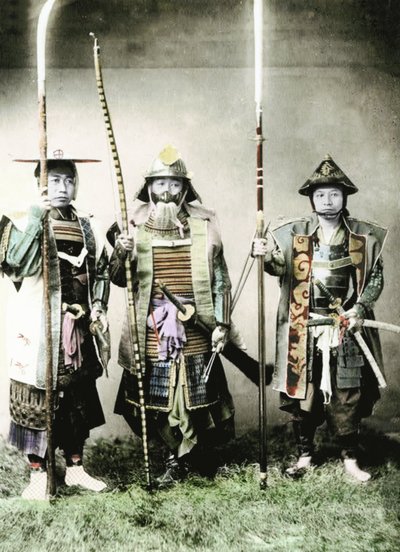 Samurai of Old Japan Armed with Long Bow, Pole Arms and Swords, 1883 (hand coloured albumen photo) by Japanese Photographer